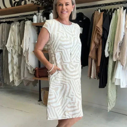 🌸 Sommerlig bohemsk blomsterkjole med rund hals