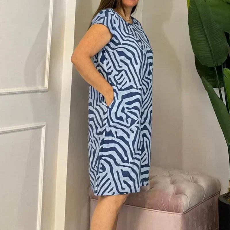 🌸 Sommerlig bohemsk blomsterkjole med rund hals